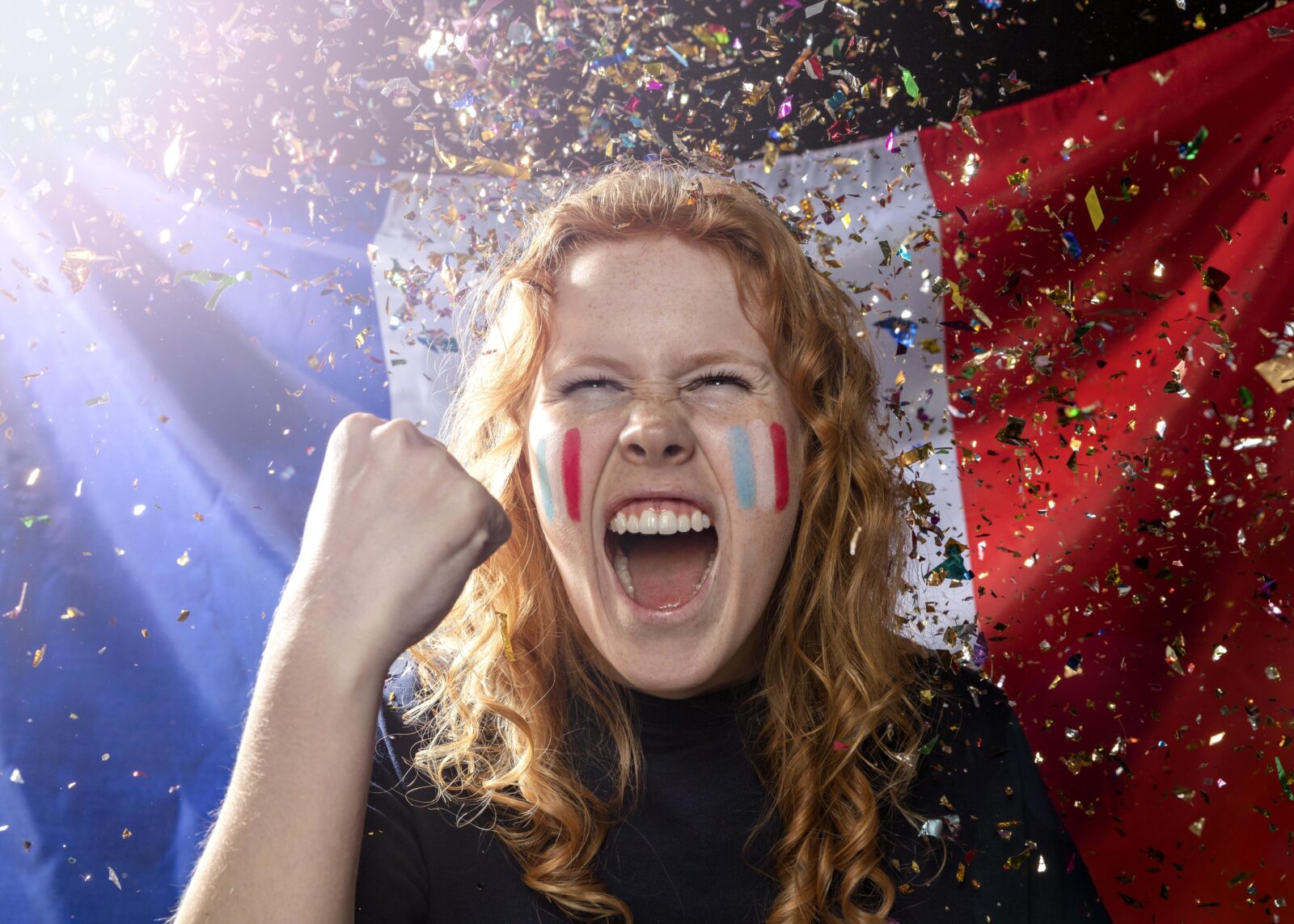 front view cheering woman with french flag confetti