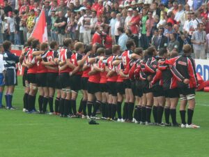 L’impact des nouvelles technologies sur le rugby canadien : transferts, fans et économie numérique Canada rugby team during anthems at RWC